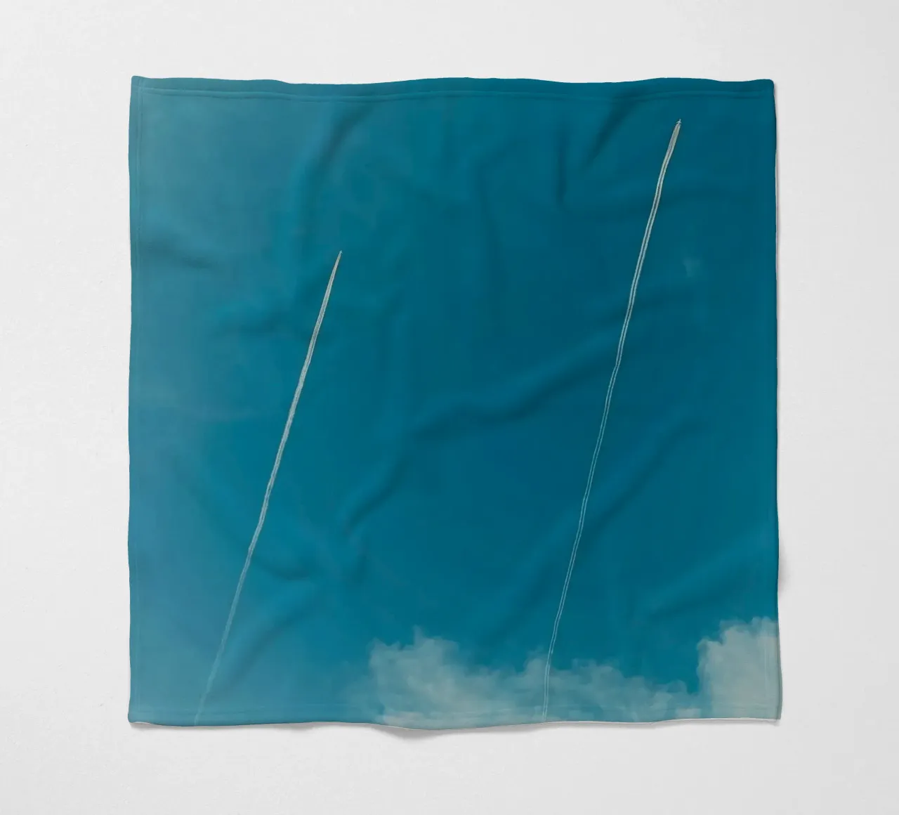 Twin contrails in the Blue Sky fleece blanket by KISSA STUDIO