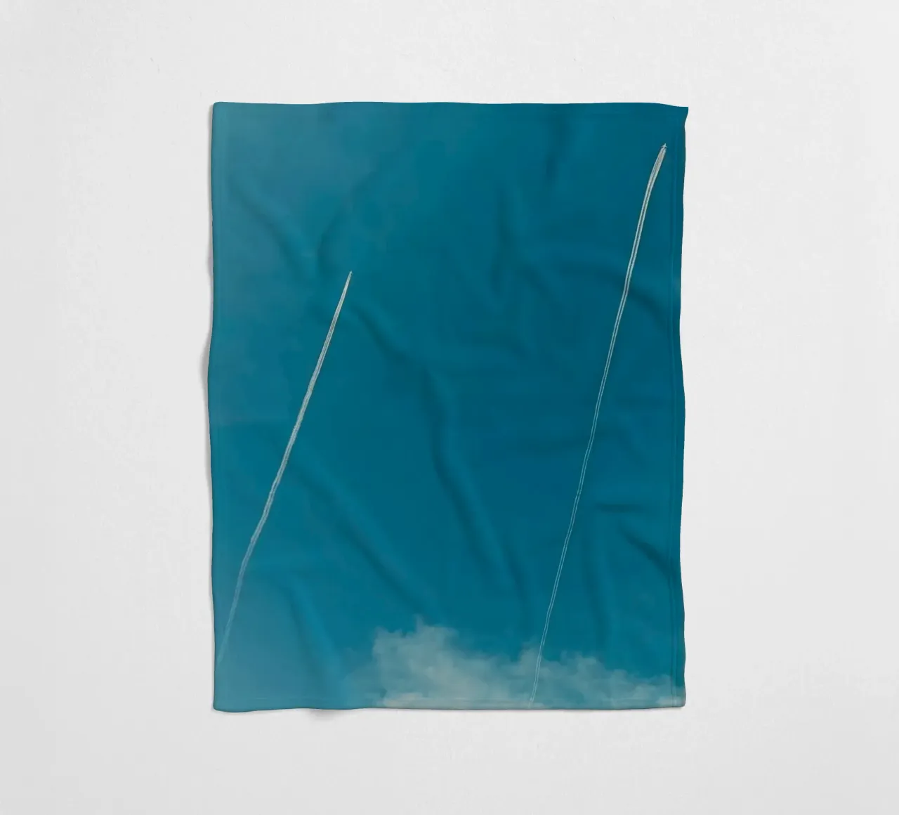 Twin contrails in the Blue Sky fleece blanket by KISSA STUDIO