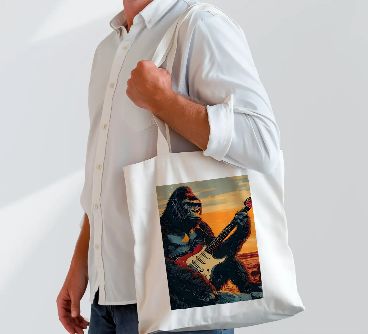 Gorilla spielt E-Gitarre am Strand borsa in juta da WILD ART