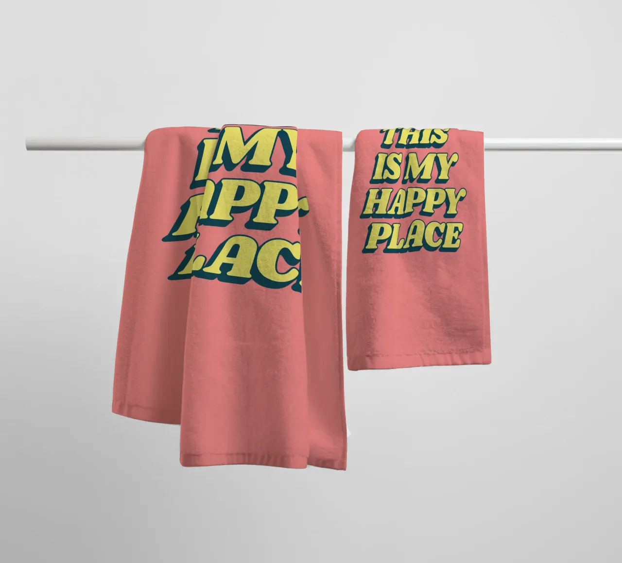 Stampa tipografica "This is My Happy Place" in giallo rosa asciugamano da bagno da THE MOTIVATED TYPE