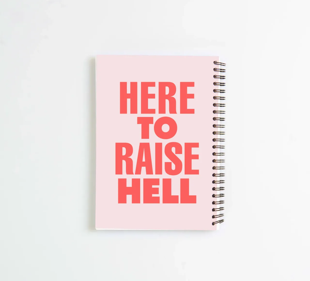 Here to Raise Hell Sassy Typography Print in Pink and Red spiral notebook by THE MOTIVATED TYPE