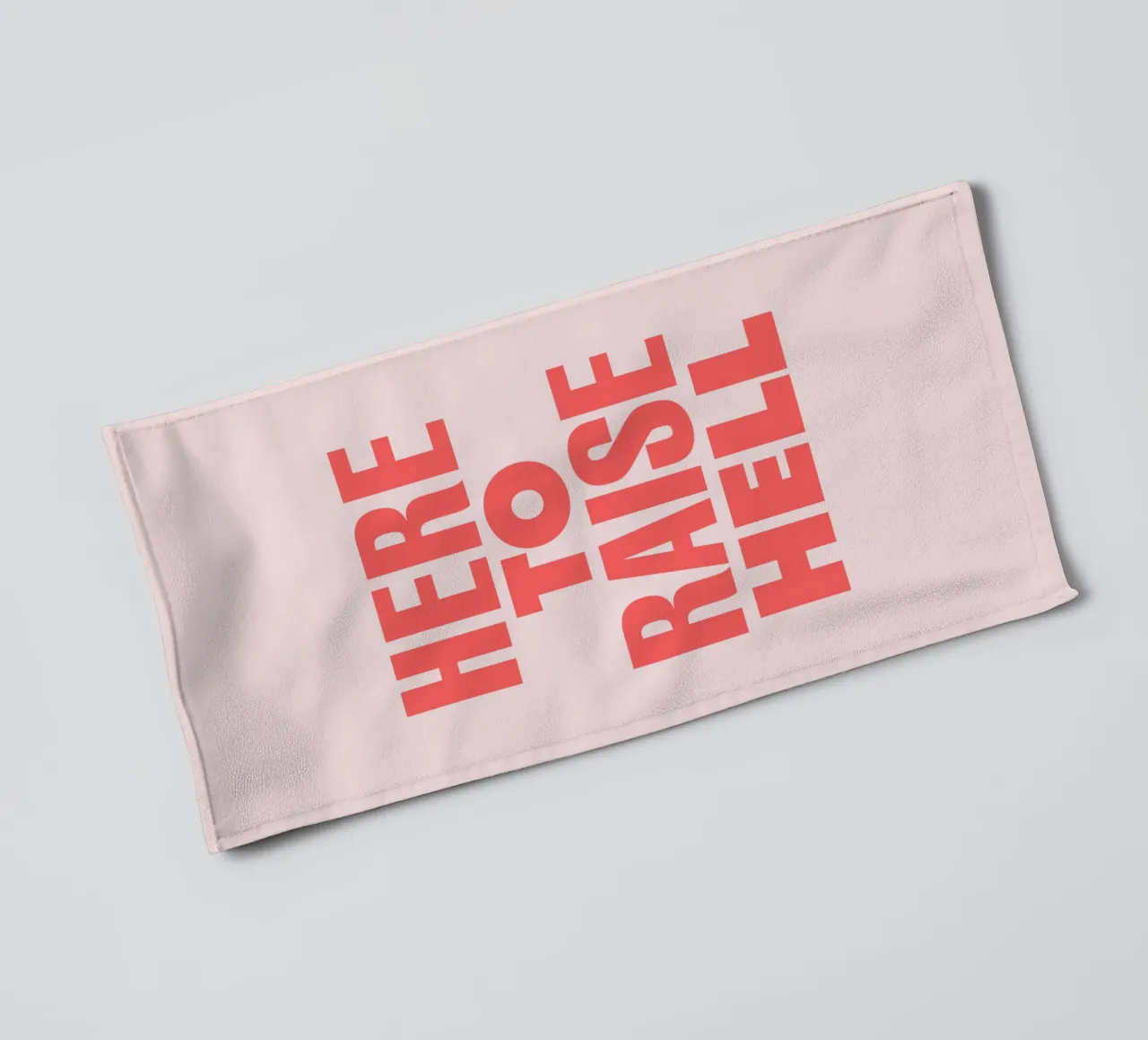 Here to Raise Hell Sassy Typography Print in Pink and Red towel by THE MOTIVATED TYPE