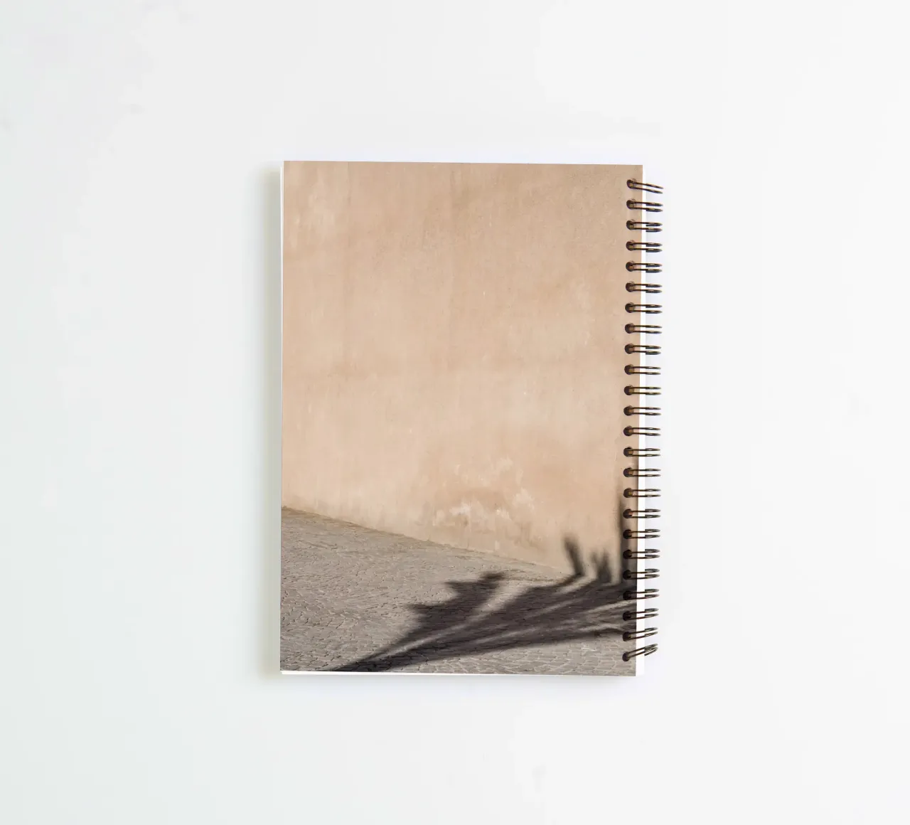 Shadow of a palm spiral notebook by photolovers