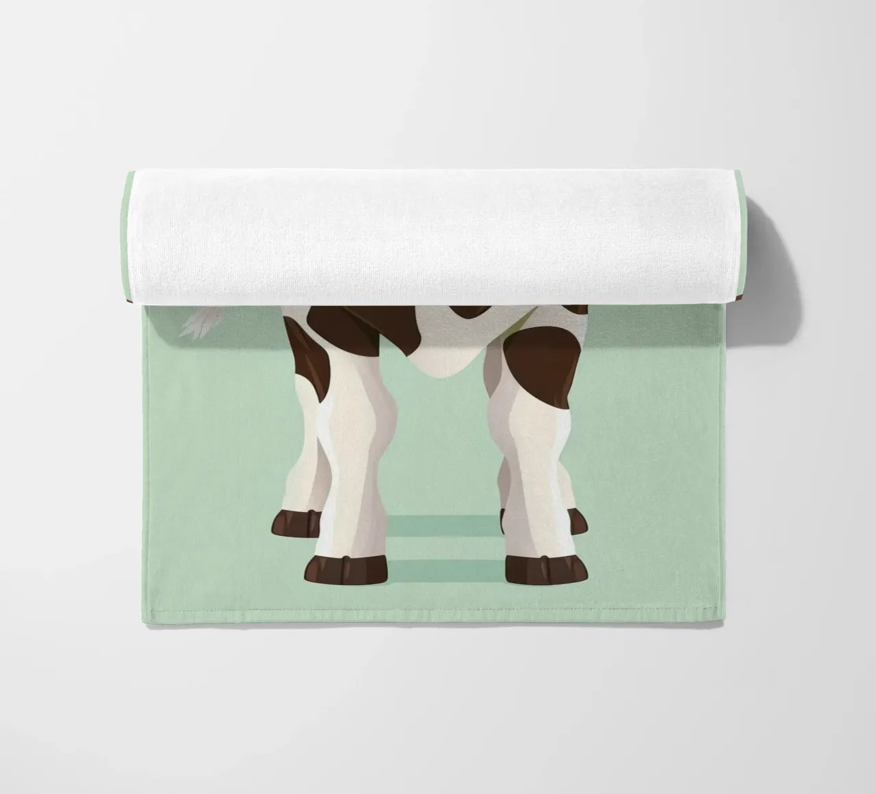charming cow design with a playful gaze beach towel by DesignDoodle