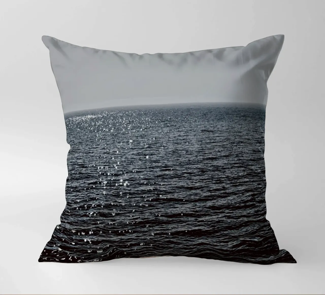 Sunlight Reflection in the Deep Blue Ocean decorative cushion by KISSA STUDIO