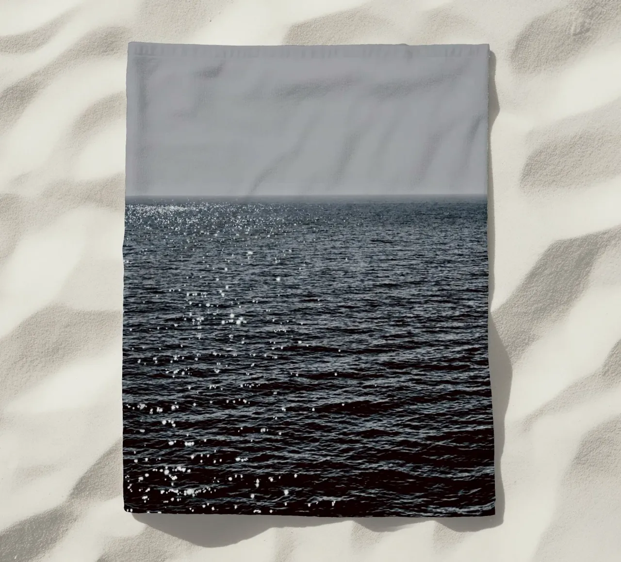Sunlight Reflection in the Deep Blue Ocean beach towel by KISSA STUDIO