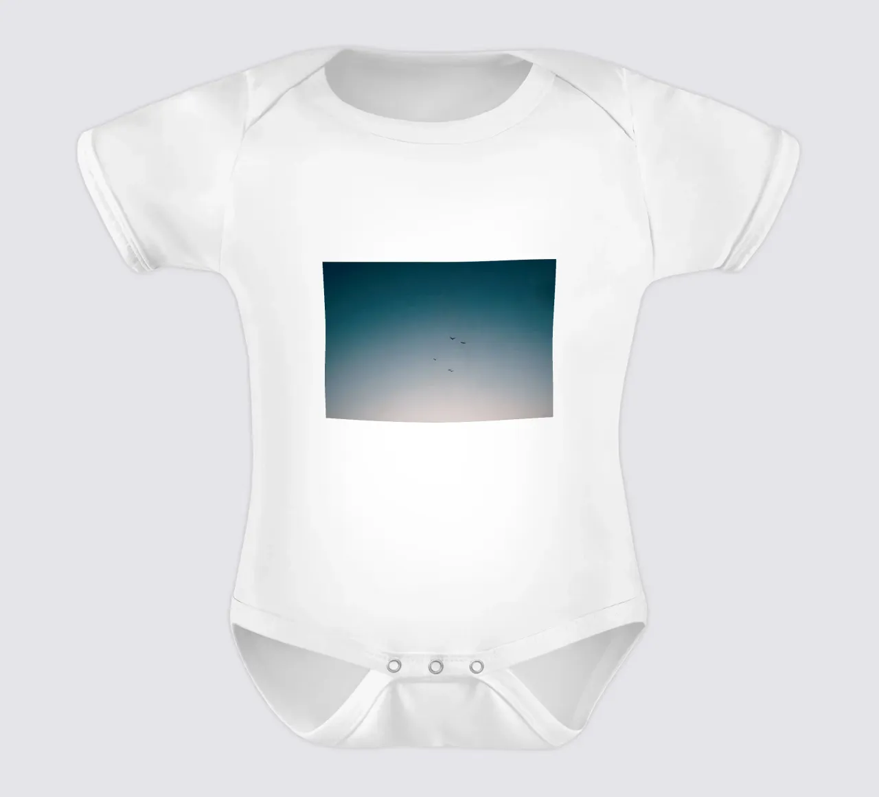 Flying Birds to the Sunset Sky short-sleeve baby romper by KISSA STUDIO