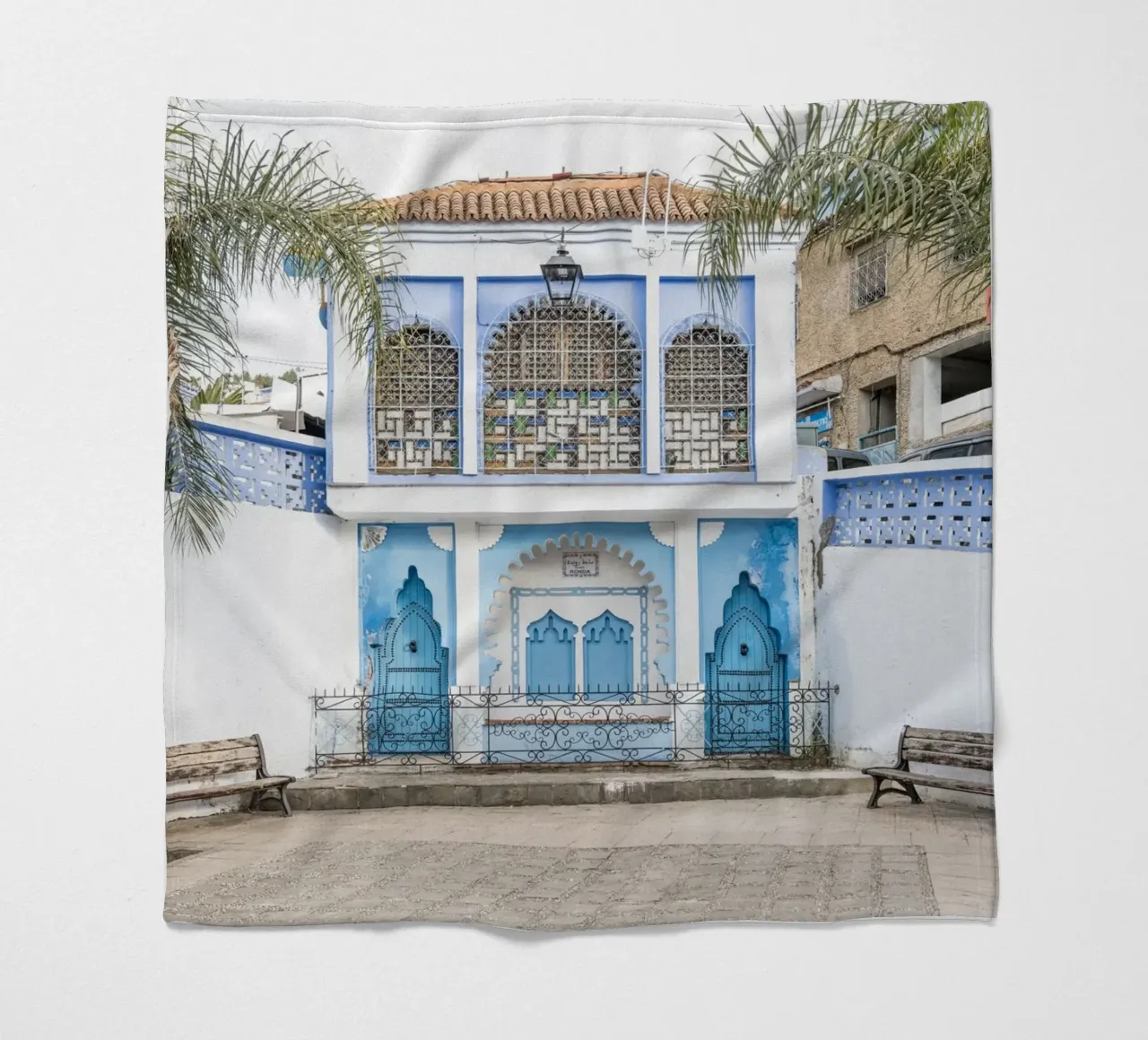Square in blue city Chefchaouen fleece blanket by photolovers