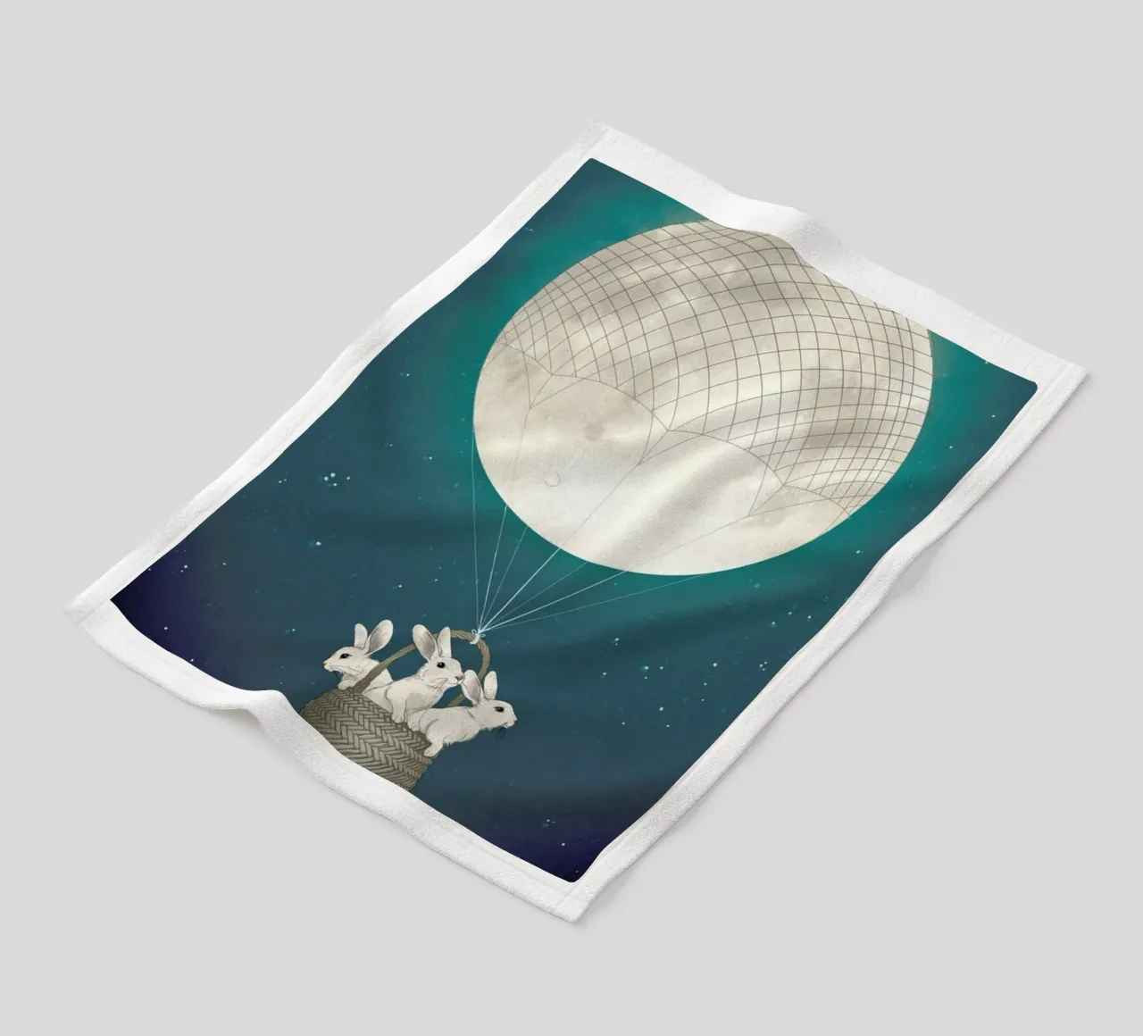 Moon Bunnies fleece blanket by Laura Graves