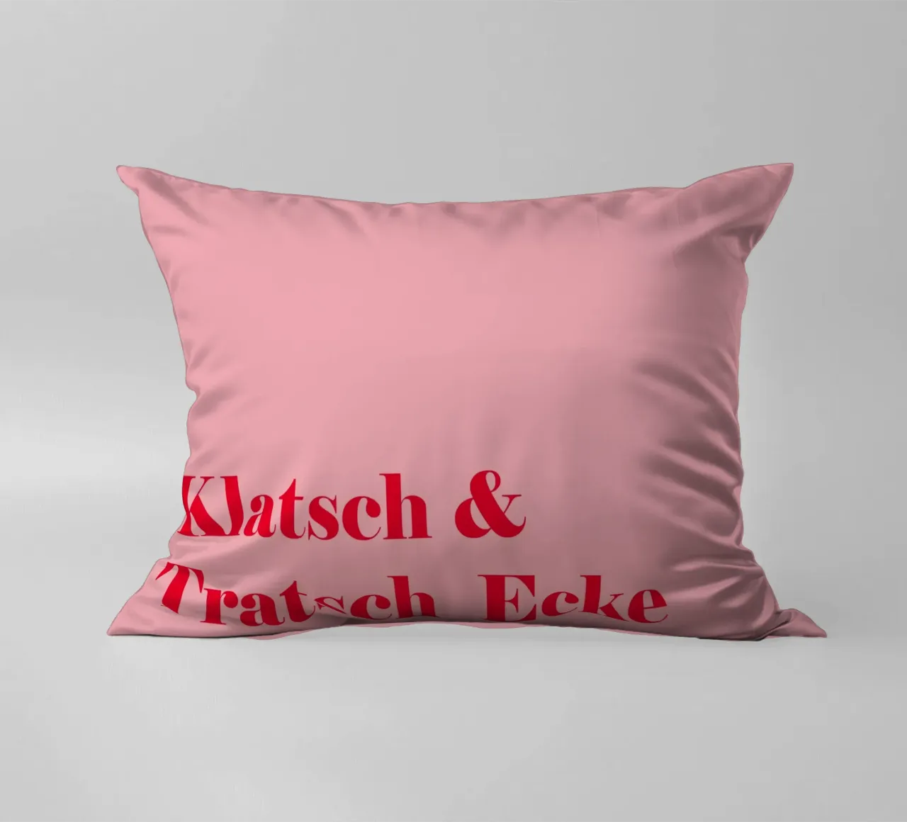 Gossip corner in raspberry red on pink for summer decorative cushion by Stilrausch