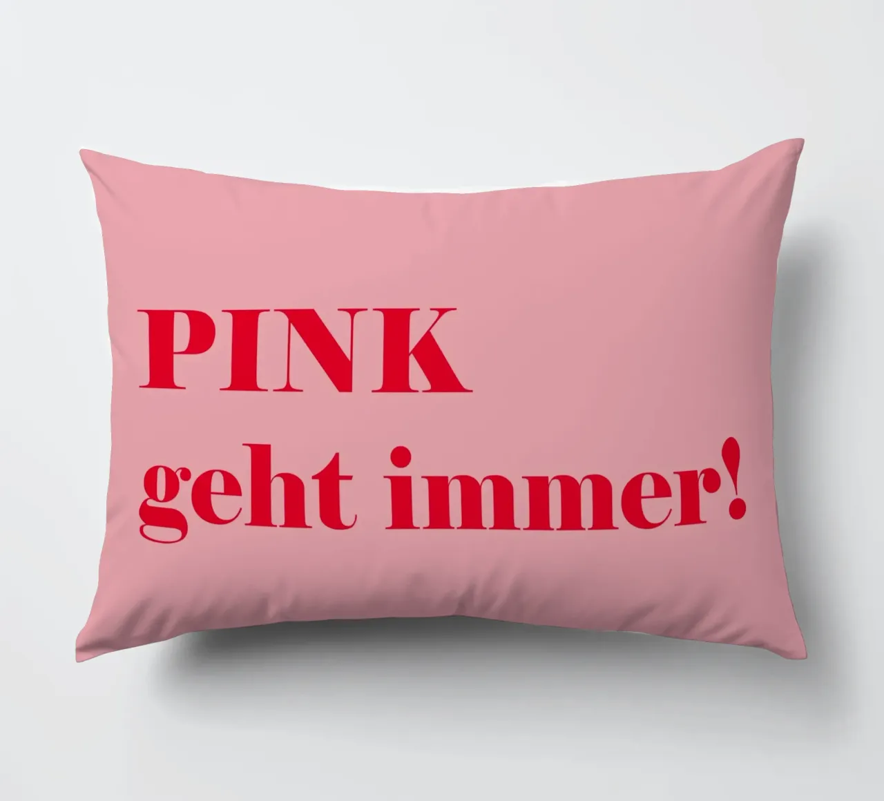 Le rose est toujours de la partie - Une déclaration joyeuse en rouge framboise pour le coussin de Stilrausch