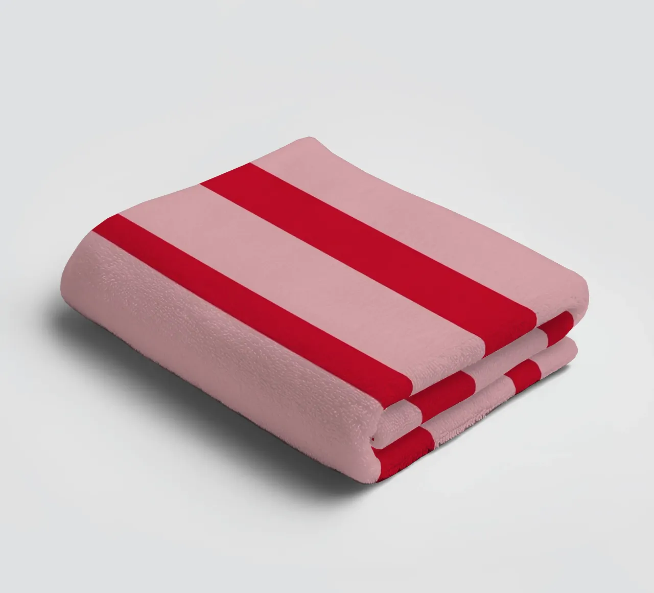 Horizontal hand-painted lines in strawberry red on pink towel by Stilrausch