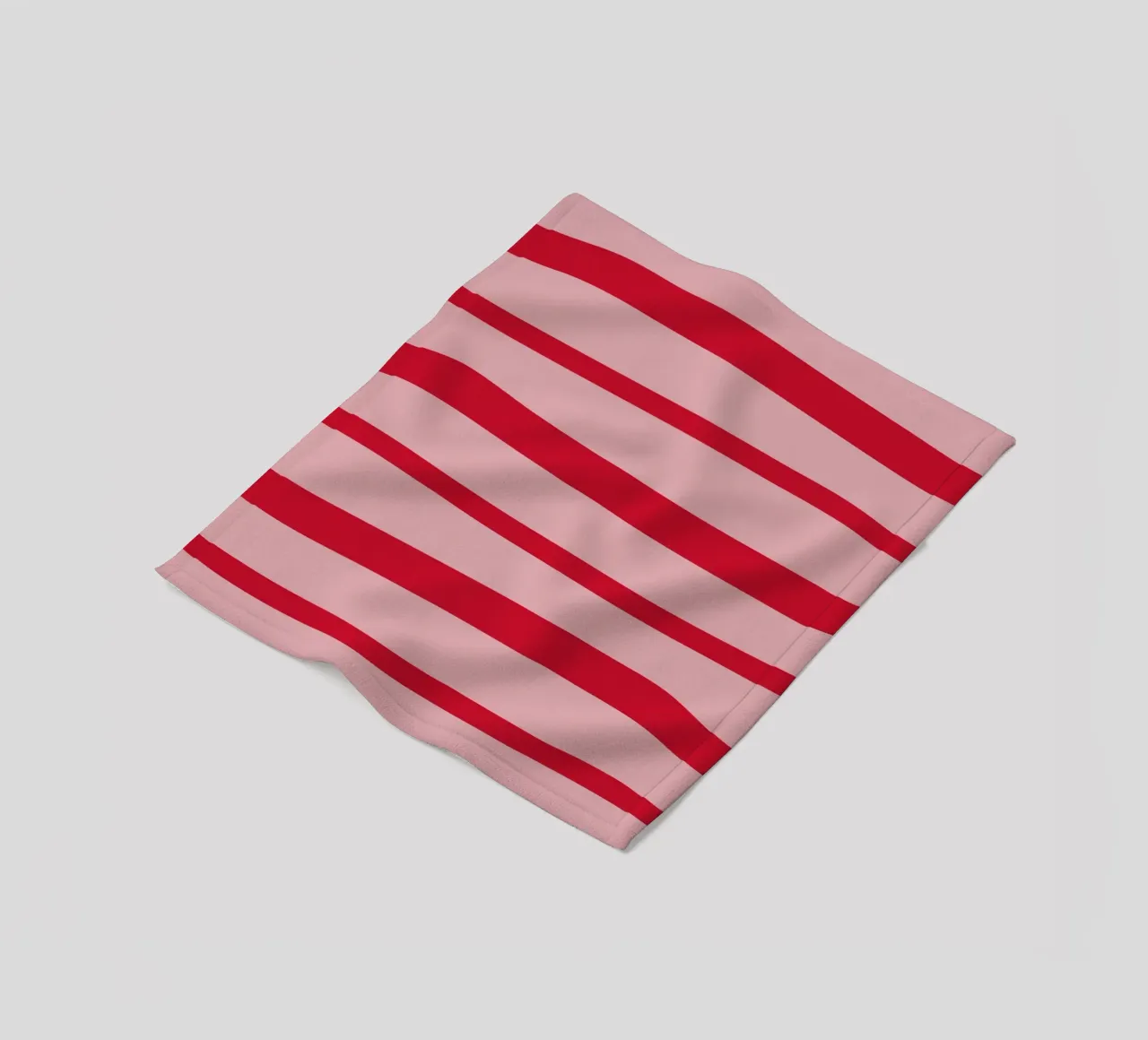 Horizontal hand-painted lines in strawberry red on pink fleece blanket by Stilrausch