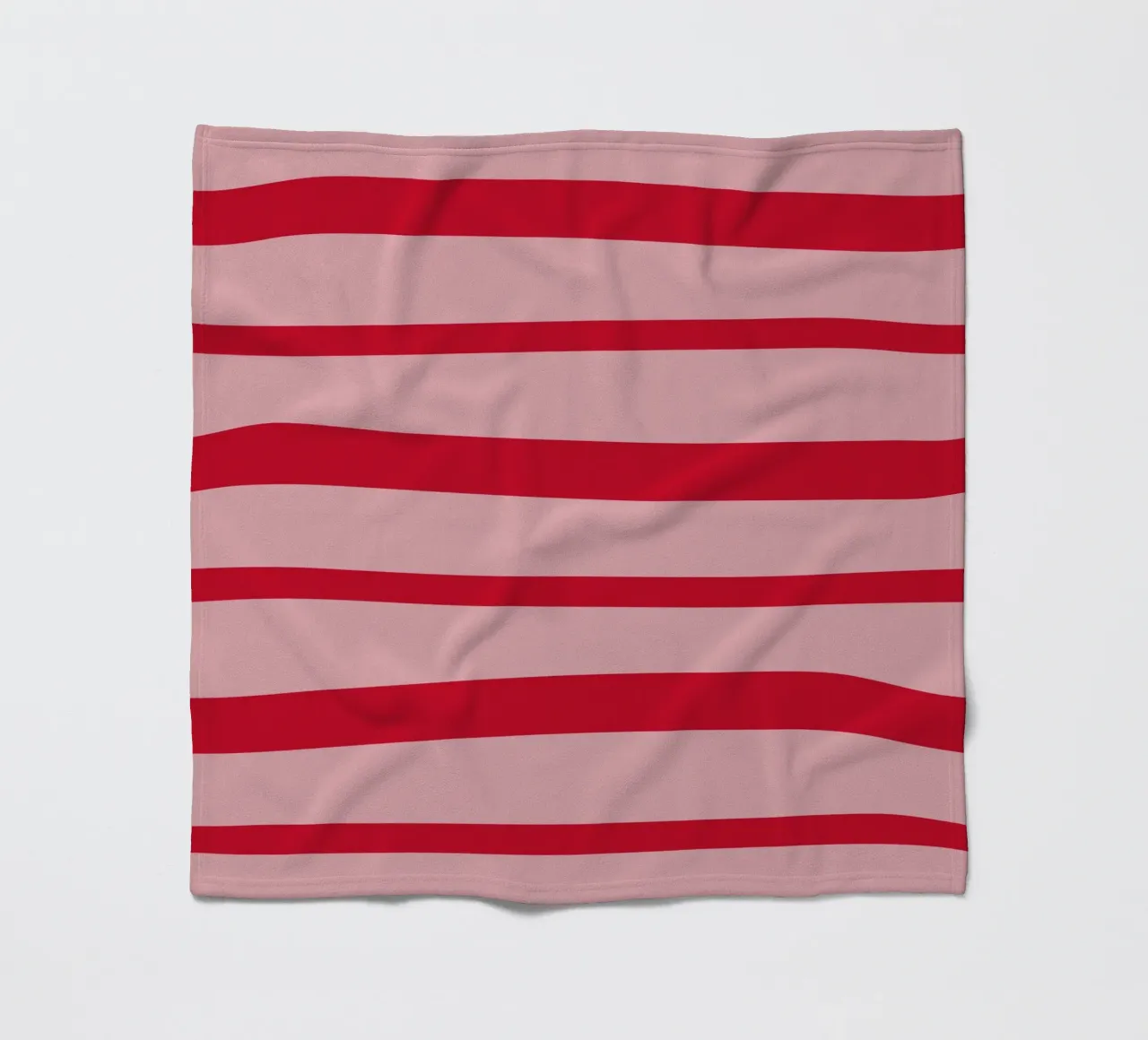 Horizontal hand-painted lines in strawberry red on pink fleece blanket by Stilrausch