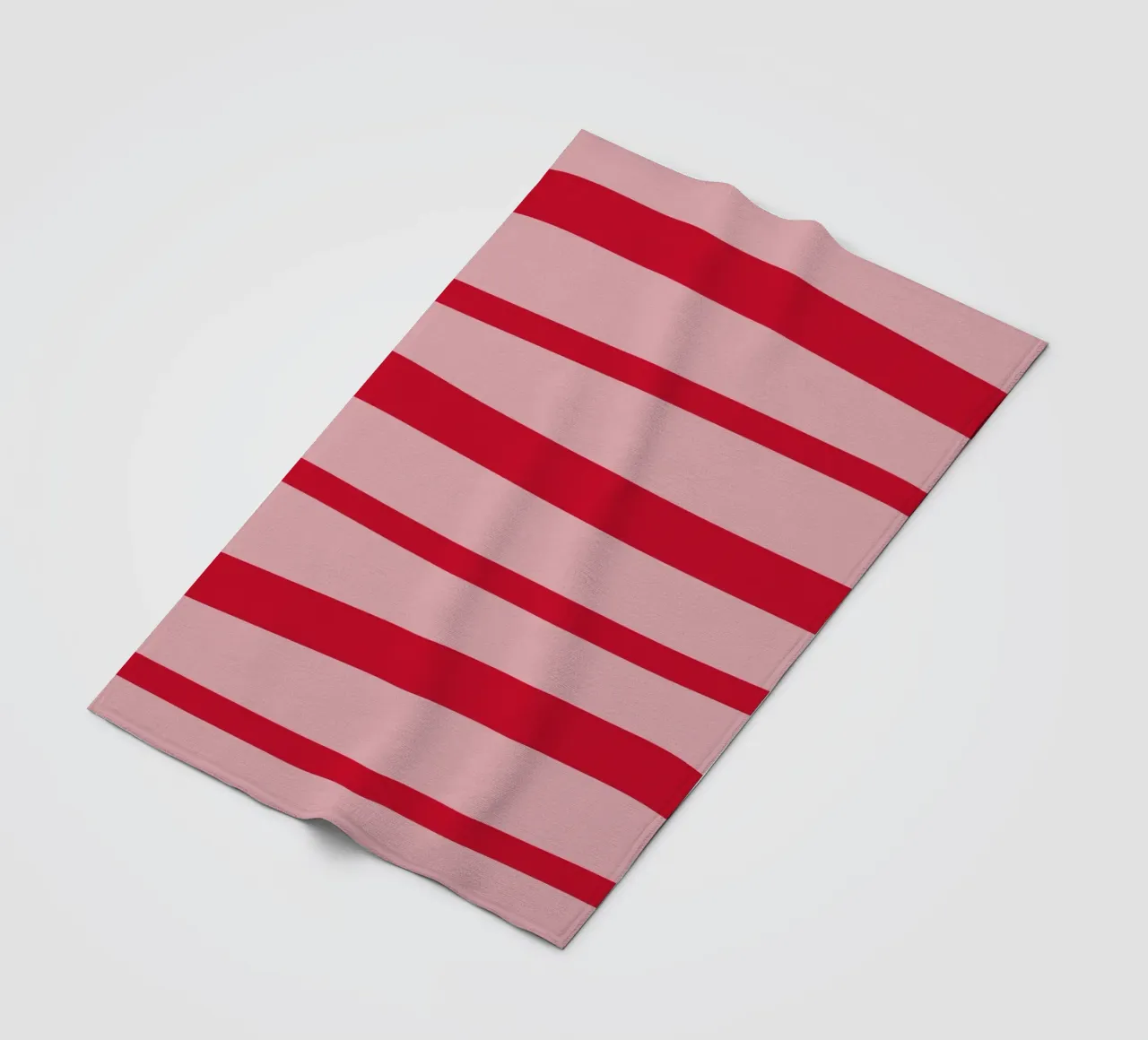 Horizontal hand-painted lines in strawberry red on pink fleece blanket by Stilrausch