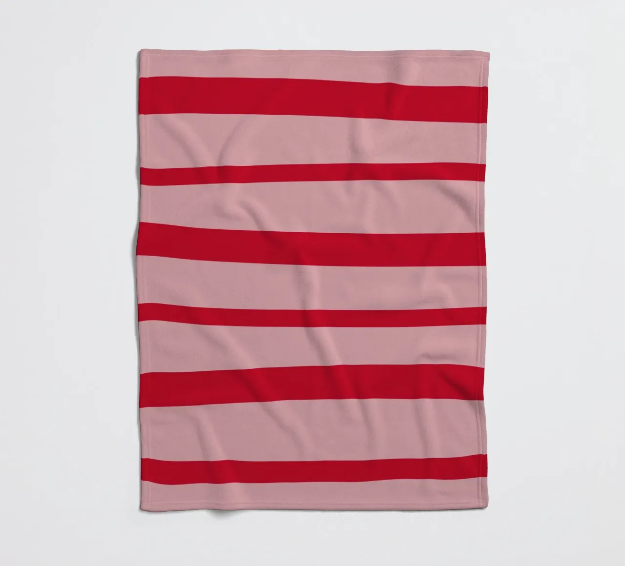 Horizontal hand-painted lines in strawberry red on pink fleece blanket by Stilrausch