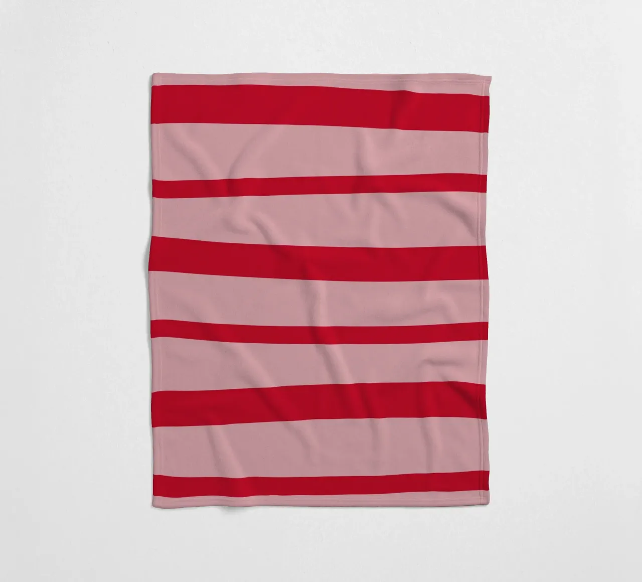Horizontal hand-painted lines in strawberry red on pink fleece blanket by Stilrausch
