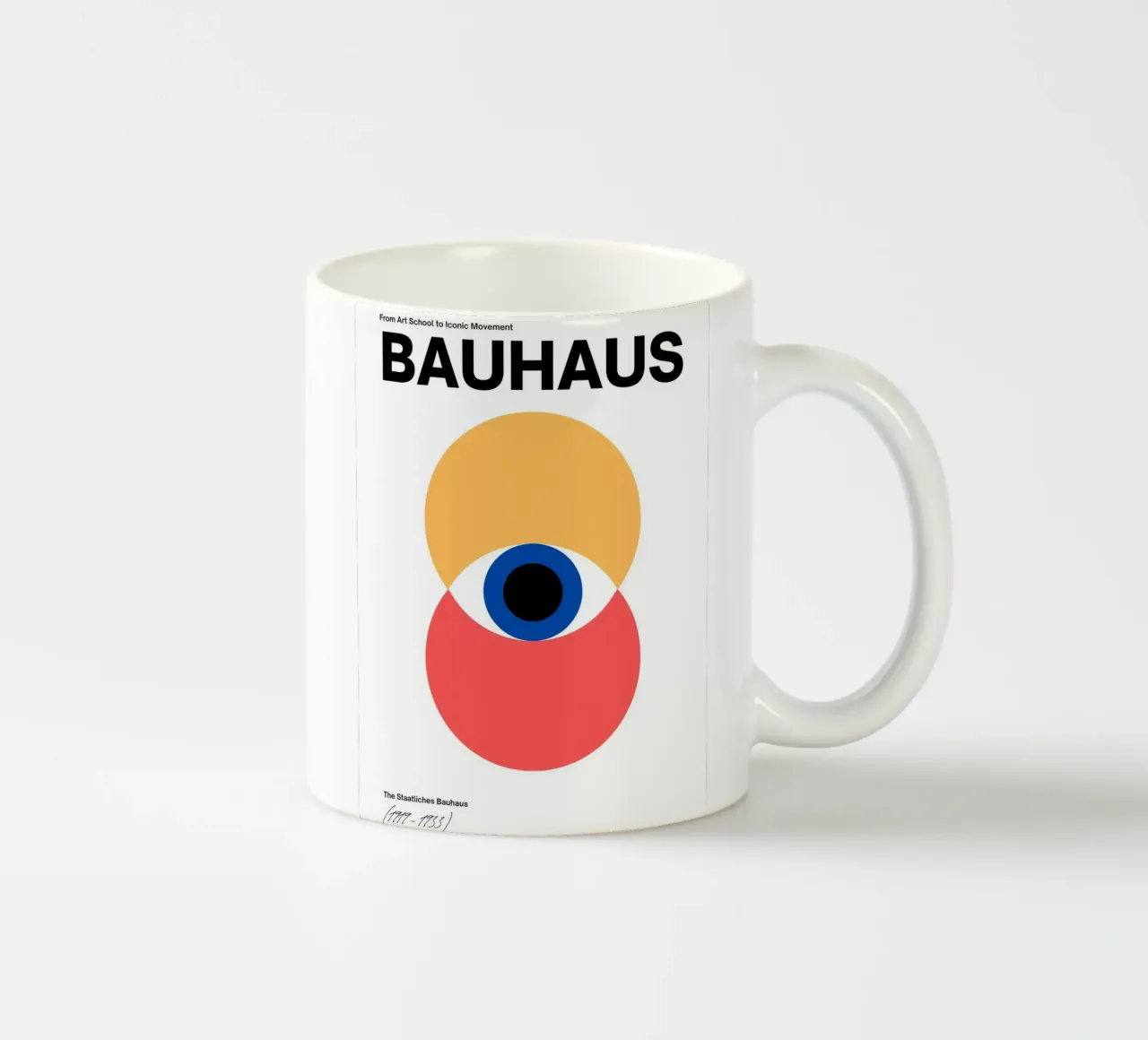 Bauhaus Eye - Abstracte geometrie in rood en geel keramische mok van Casa Calm