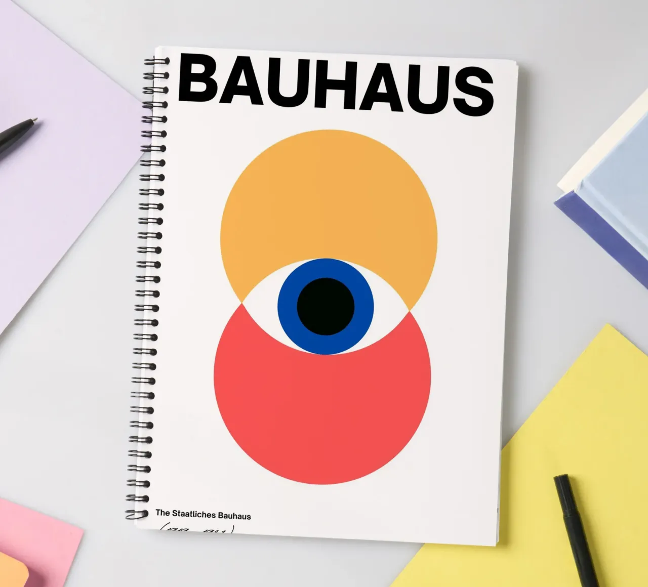 Bauhaus Eye - Abstract geometry in red and yellow spiral notebook by Casa Calm