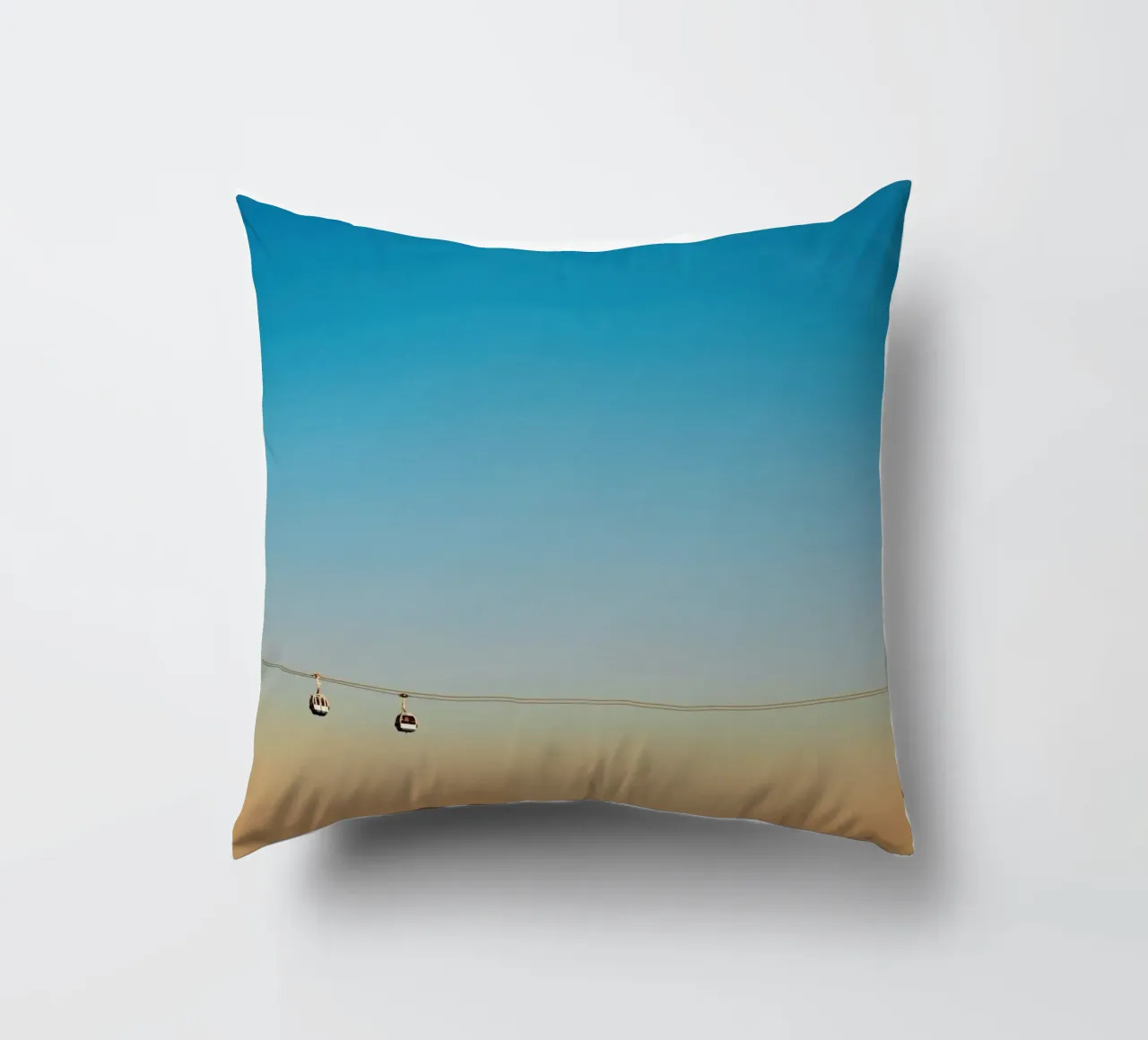 Cable Cars in Orange Sunset decorative cushion by KISSA STUDIO
