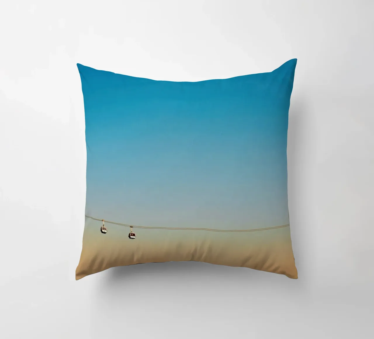 Cable Cars in Orange Sunset decorative cushion by KISSA STUDIO