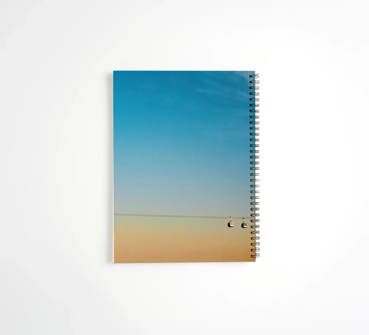 Cable Cars in Orange Sunset spiral notebook by KISSA STUDIO
