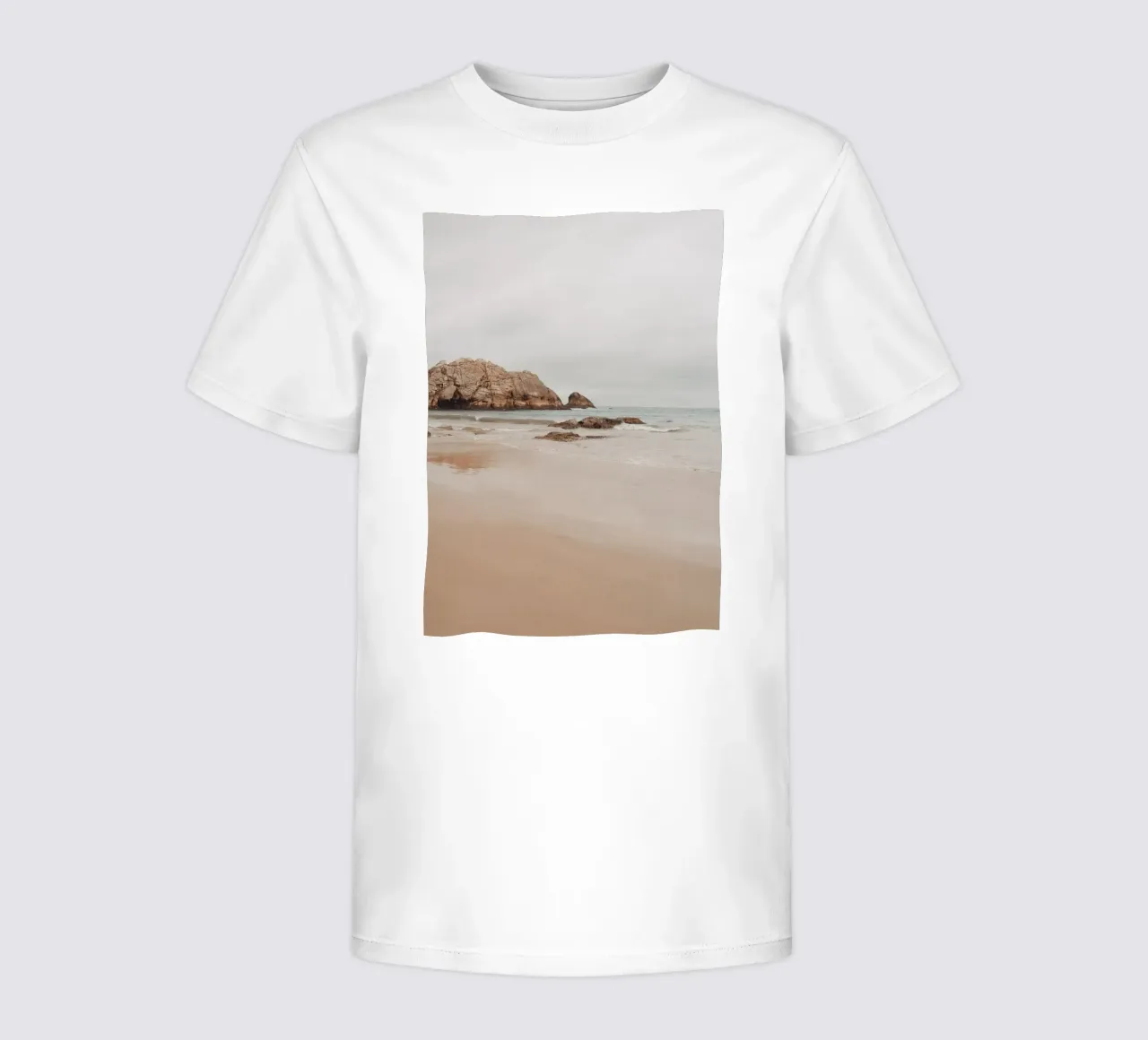 Misty Coastal Beach with Rocks - Serene Seascape Art kids t-shirt by ClubArt