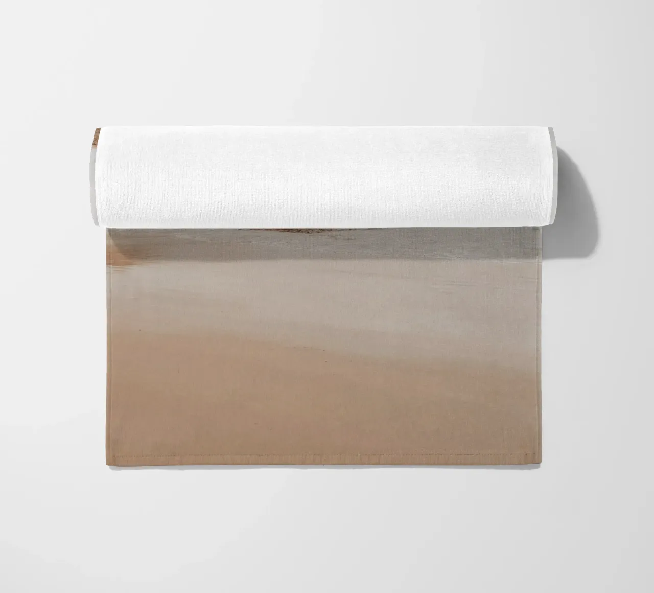Misty Coastal Beach with Rocks - Serene Seascape Art beach towel by ClubArt