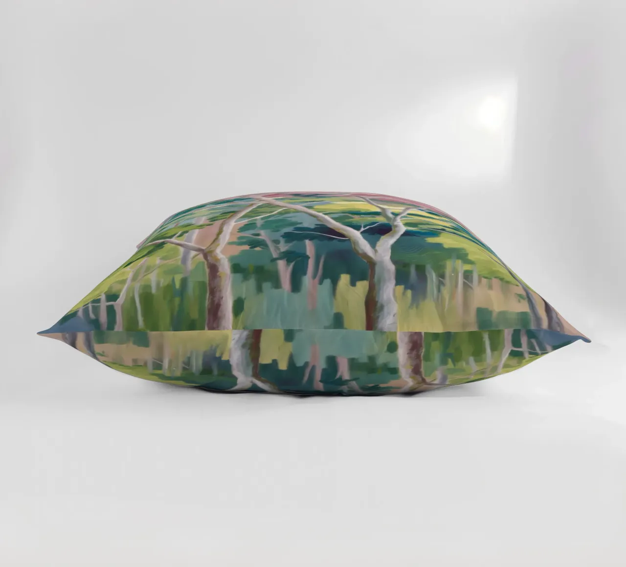Forest's Emerald Light decorative cushion by Dream Spectrum