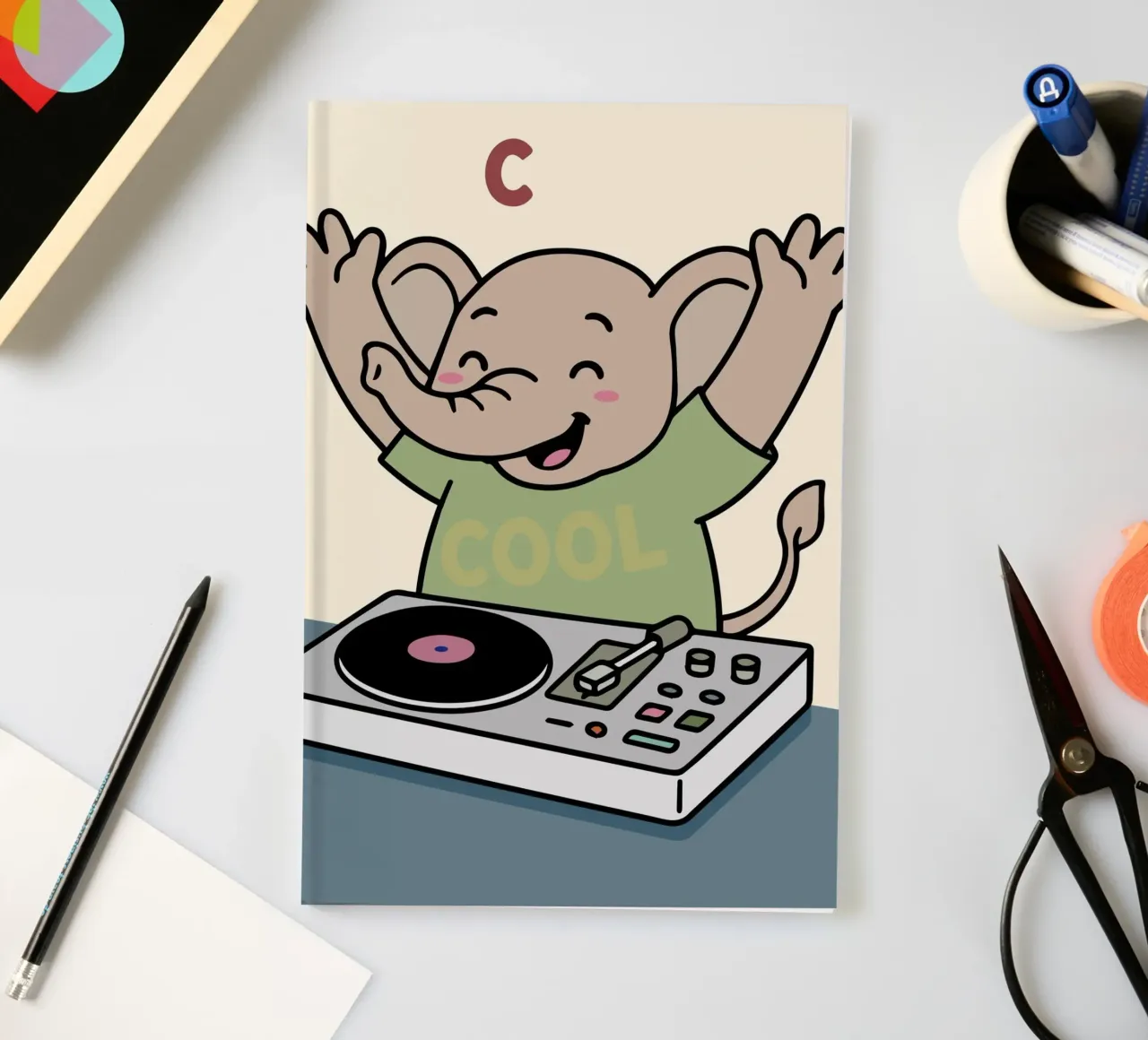 Dancing elephant with a feeling for music parties as a DJ notebook by namosh