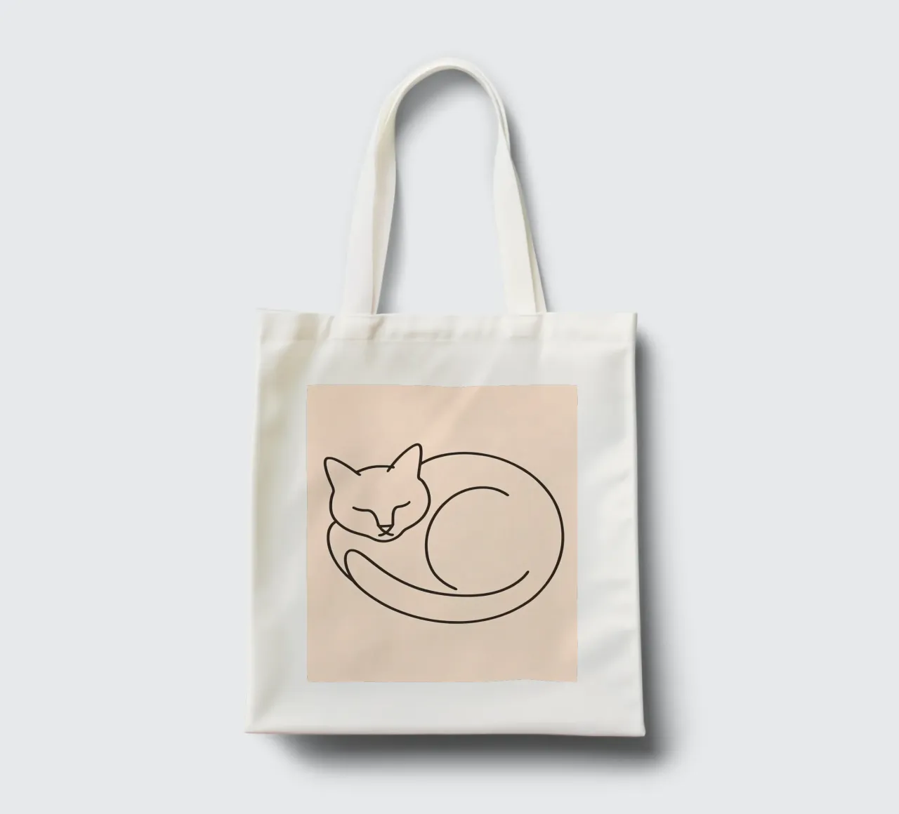 Line drawing of a curled-up cat resting on a soft background tote bag by DesignDoodle