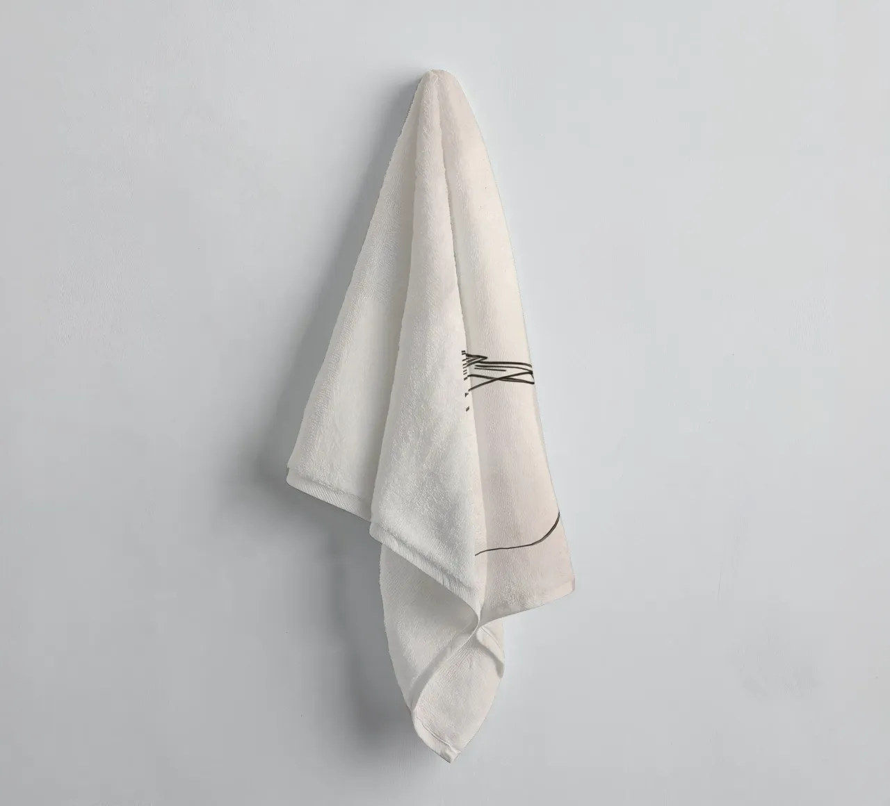 Bird perched on a delicate line amidst light background towel by DesignDoodle