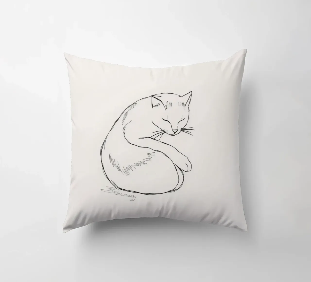 Line drawing of a resting cat with a minimalist design decorative cushion by DesignDoodle