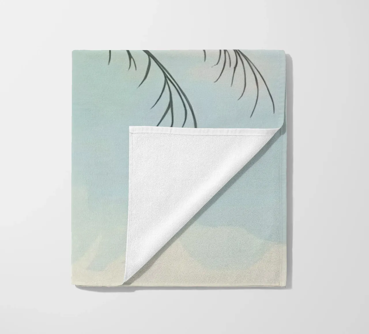 Stylized palm tree silhouette against a soft pastel backdrop beach towel by DesignDoodle