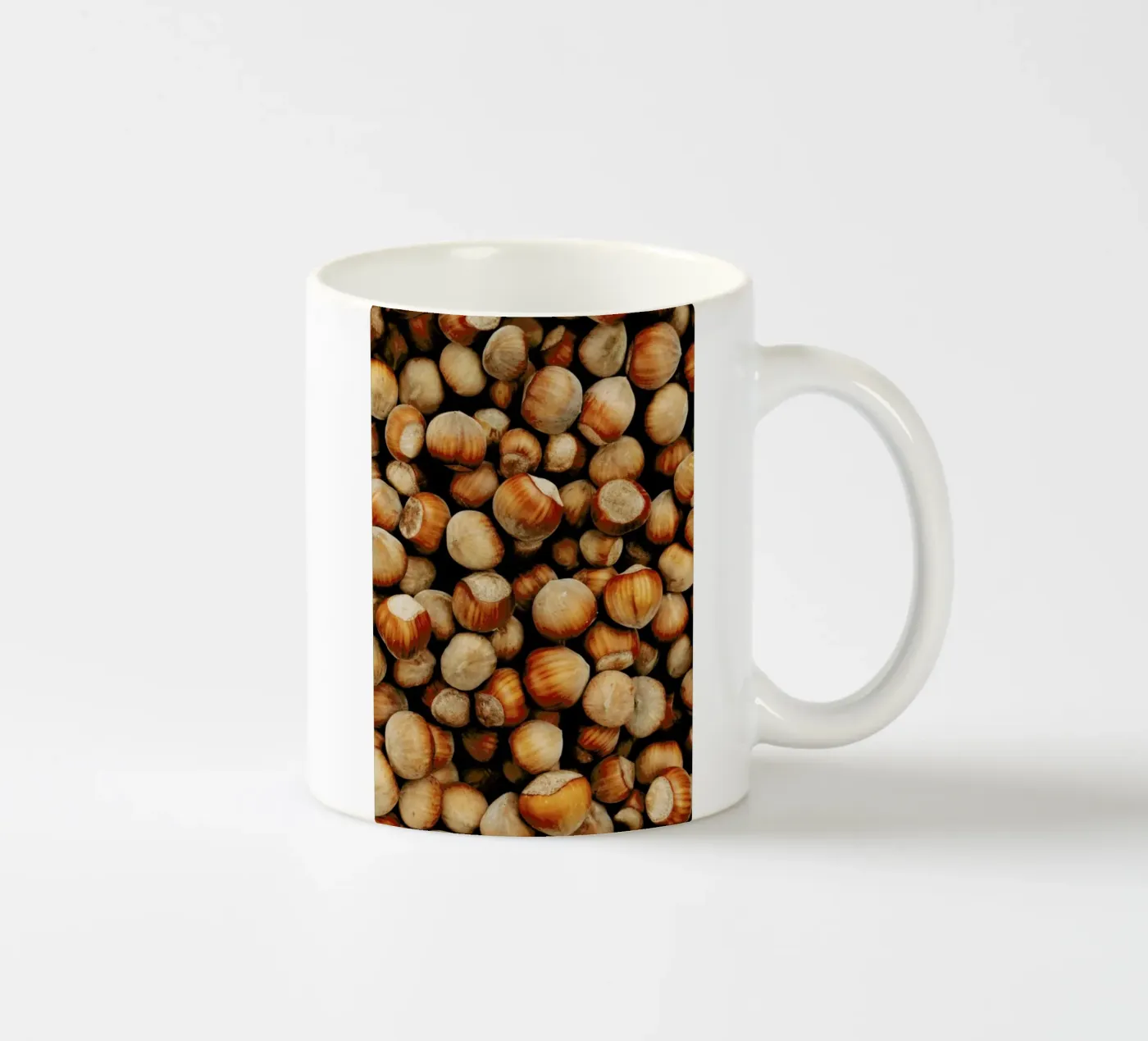 Hazelnuts ceramic mug by Sebastian Hilgetag