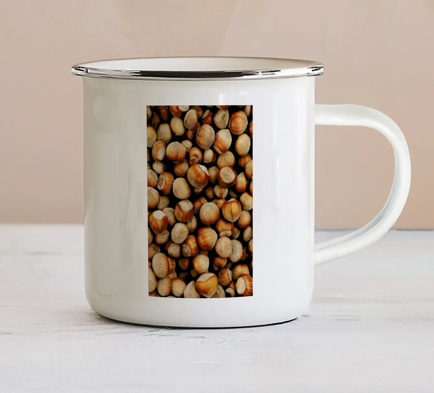 Hazelnuts enamel mug by Sebastian Hilgetag