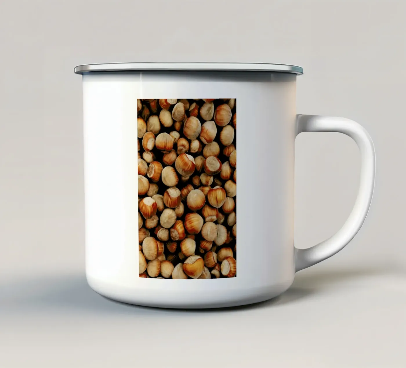 Hazelnuts enamel mug by Sebastian Hilgetag