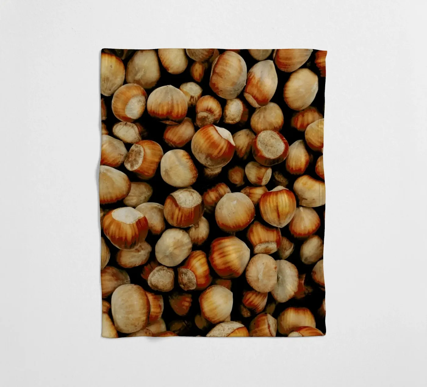 Hazelnuts fleece blanket by Sebastian Hilgetag