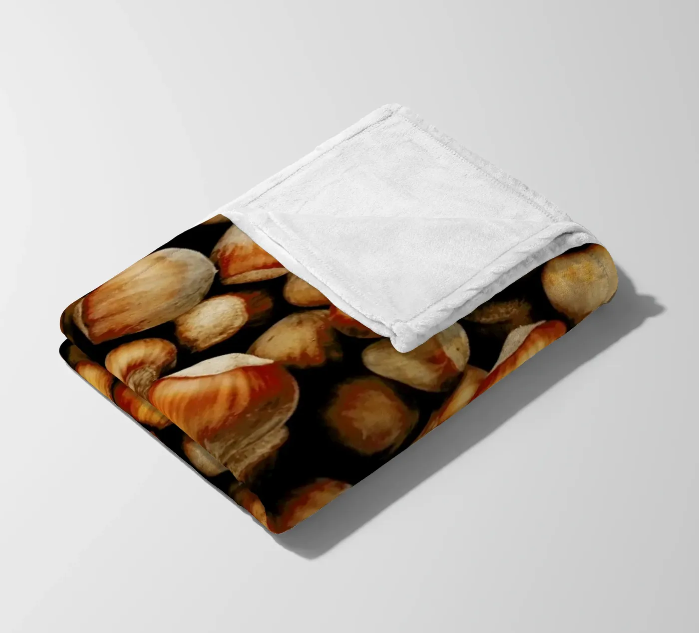 Hazelnuts fleece blanket by Sebastian Hilgetag