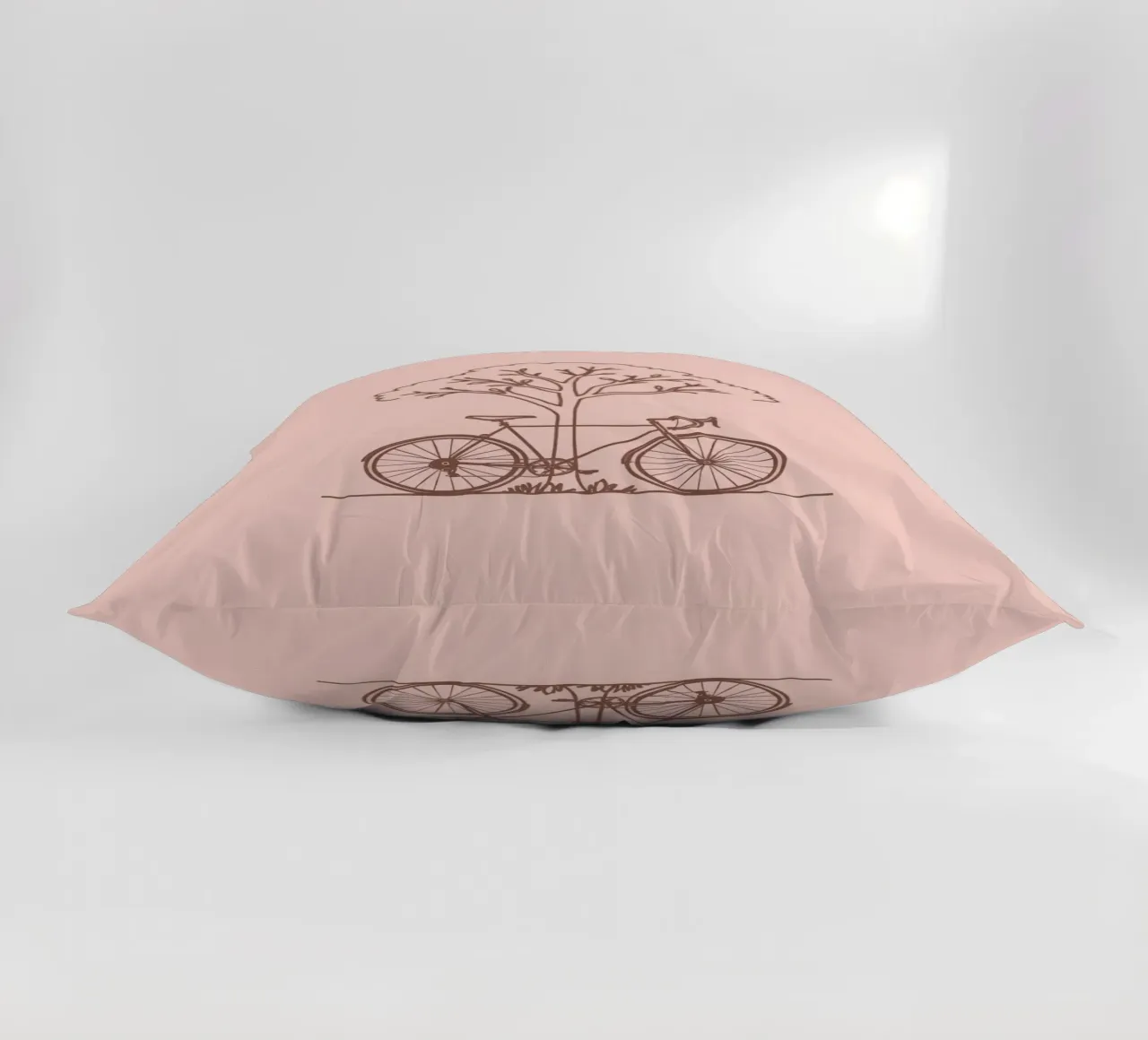 Bicyclette adossée à un arbre dans un parc au design simple coussin de DesignDoodle