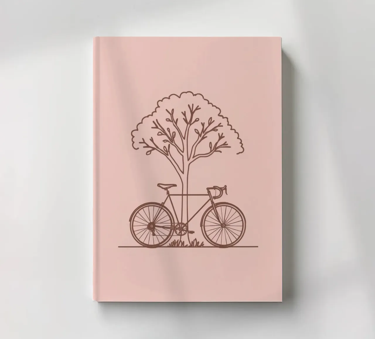 Bicycle leaning against a tree in a park with simple design notebook by DesignDoodle
