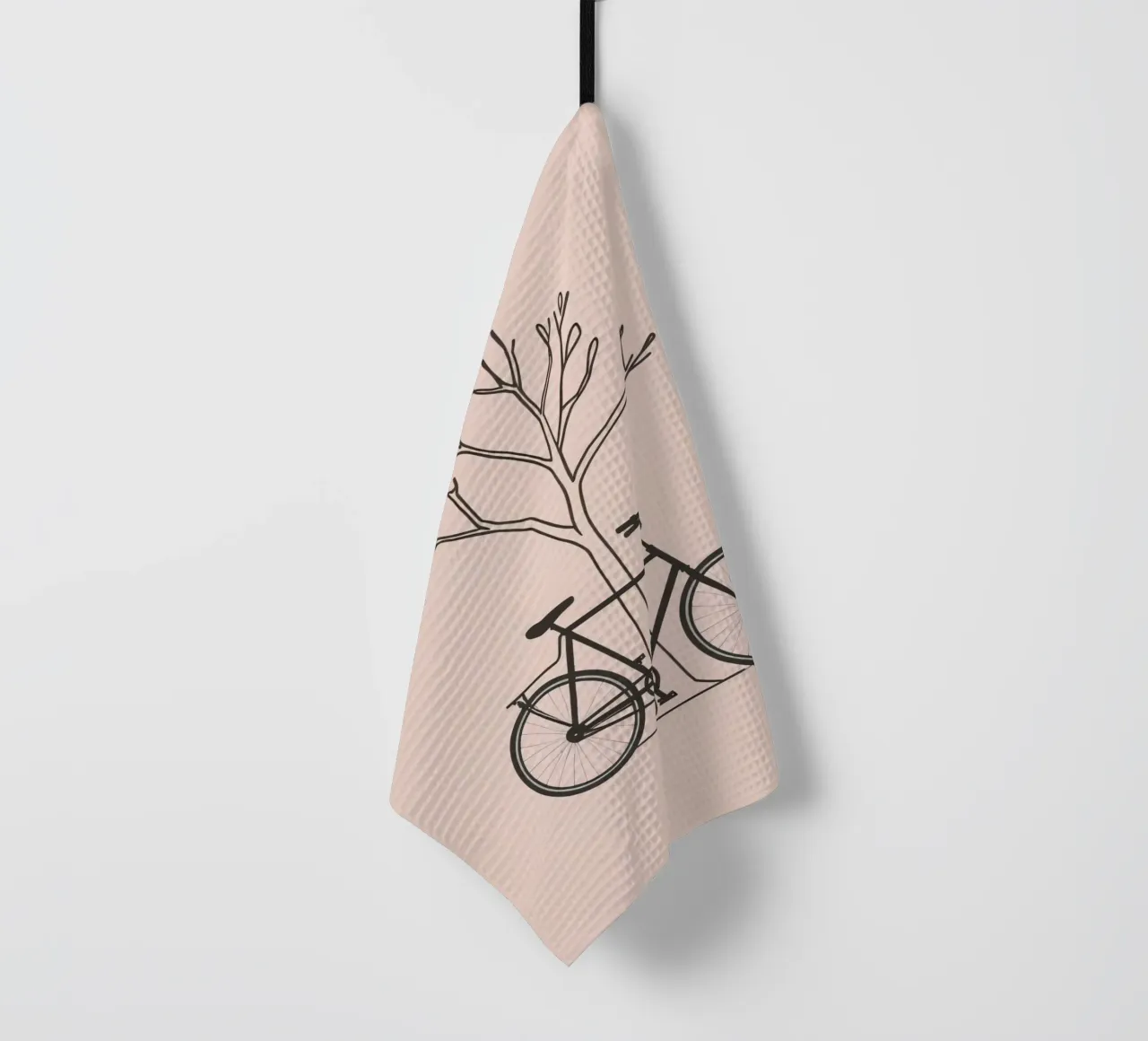 Bicycle leaning against a bare tree on a muted background tea towel by DesignDoodle