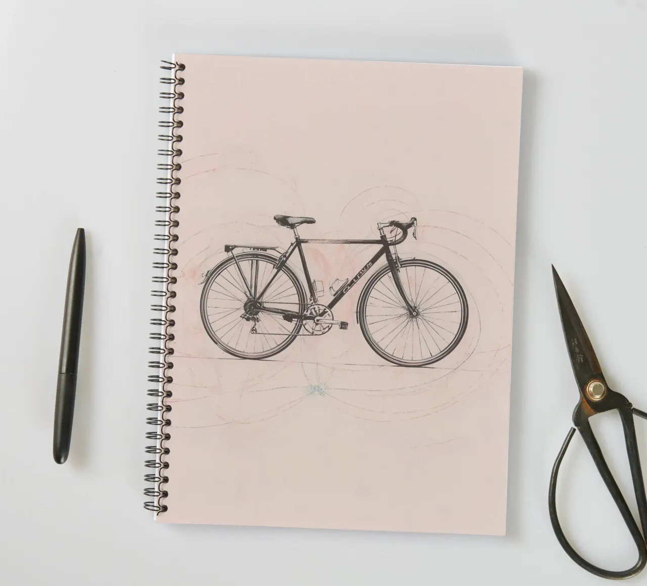 Bicycle sketch illustrating motion with swirling lines spiral notebook by DesignDoodle