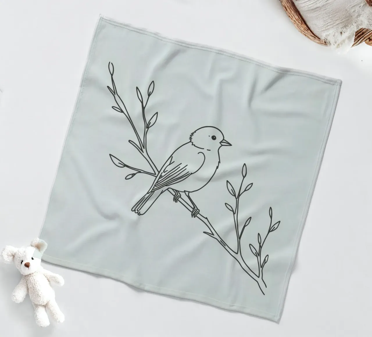 Bird perched on a branch with delicate leaves fleece blanket by DesignDoodle