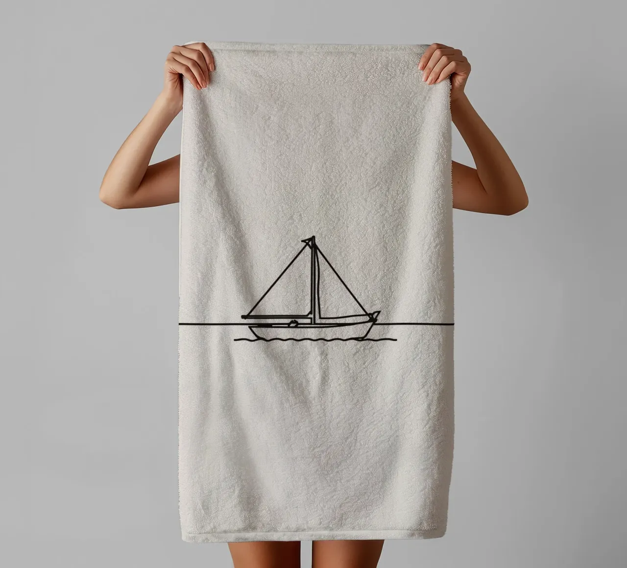 Sailboat gliding across calm waters under a clear sky towel by DesignDoodle
