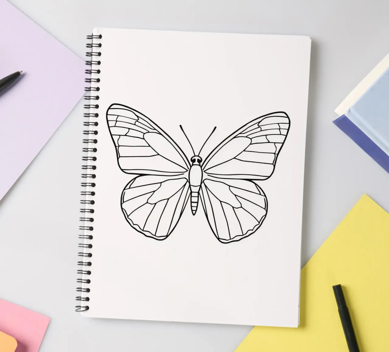 butterfly displaying intricate linework and elegant symmetry spiral notebook by DesignDoodle