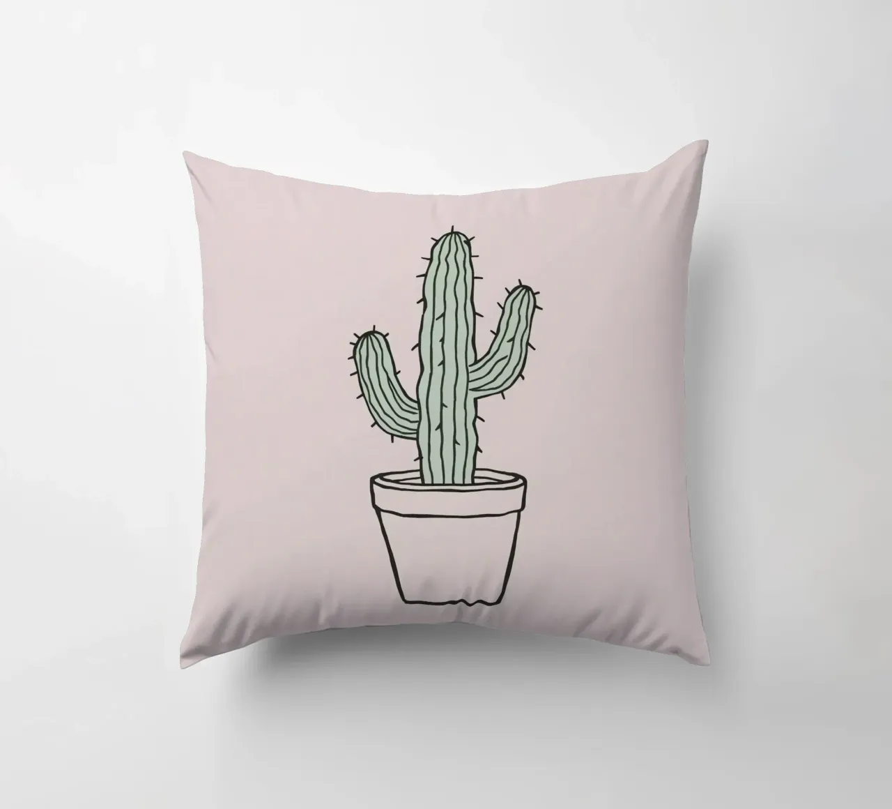 Cactus in un vaso minimalista su uno sfondo rosa tenue cuscino da DesignDoodle