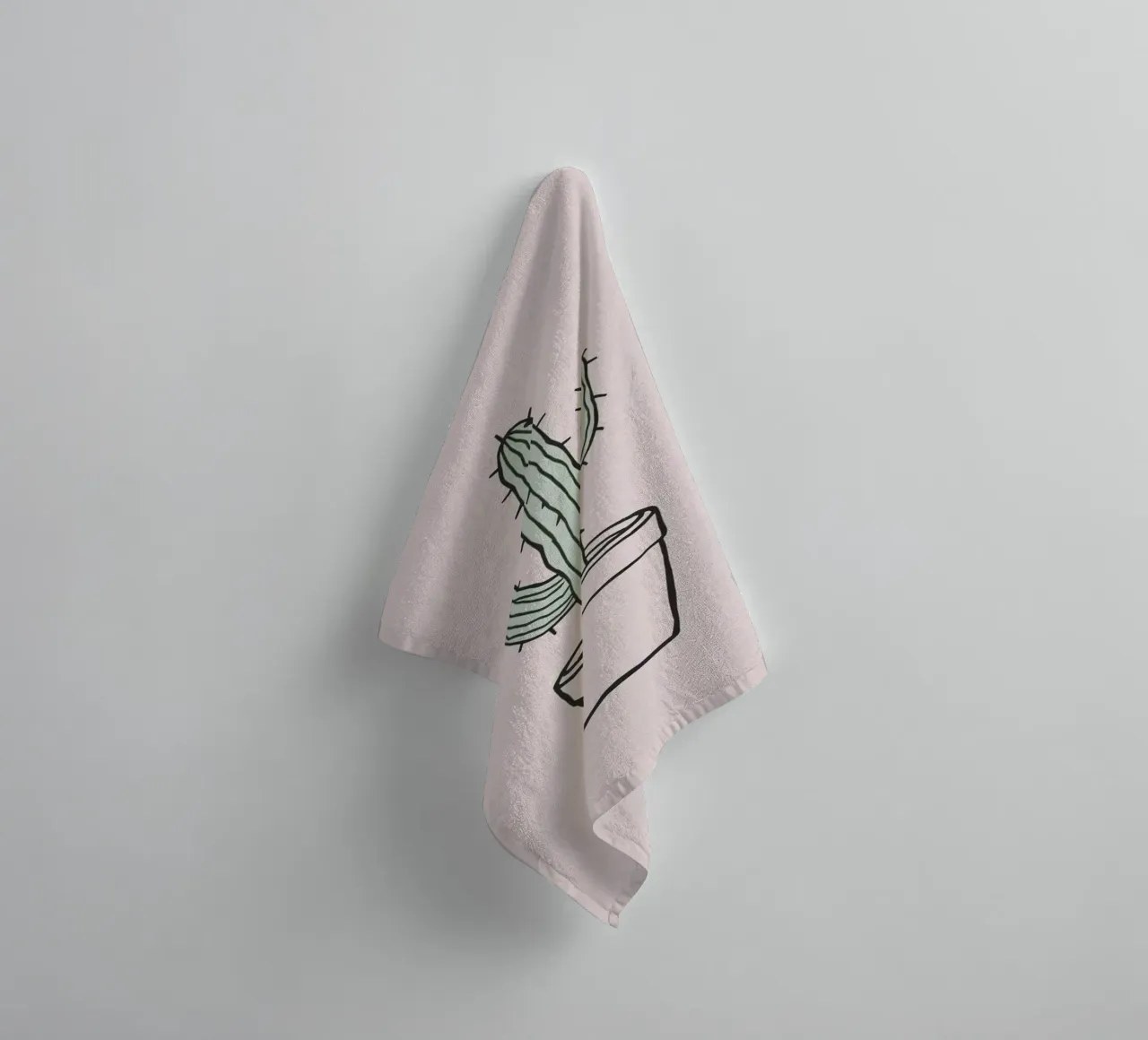 Cactus in a minimalist pot against a soft pink background towel by DesignDoodle