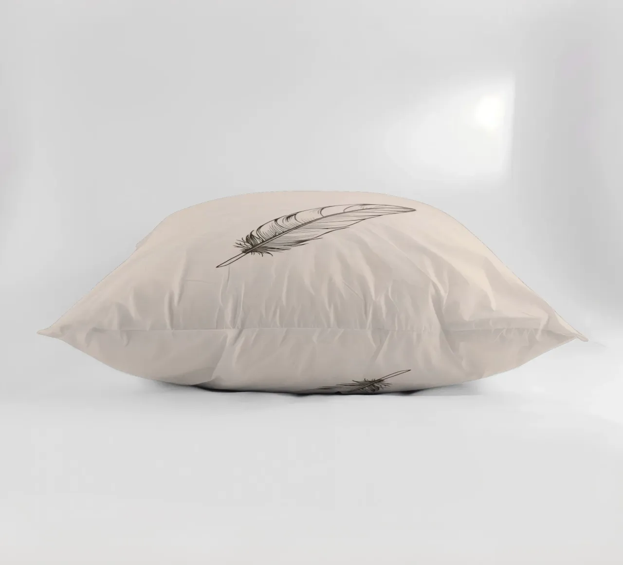 Delicate black feather resting on a light background decorative cushion by DesignDoodle