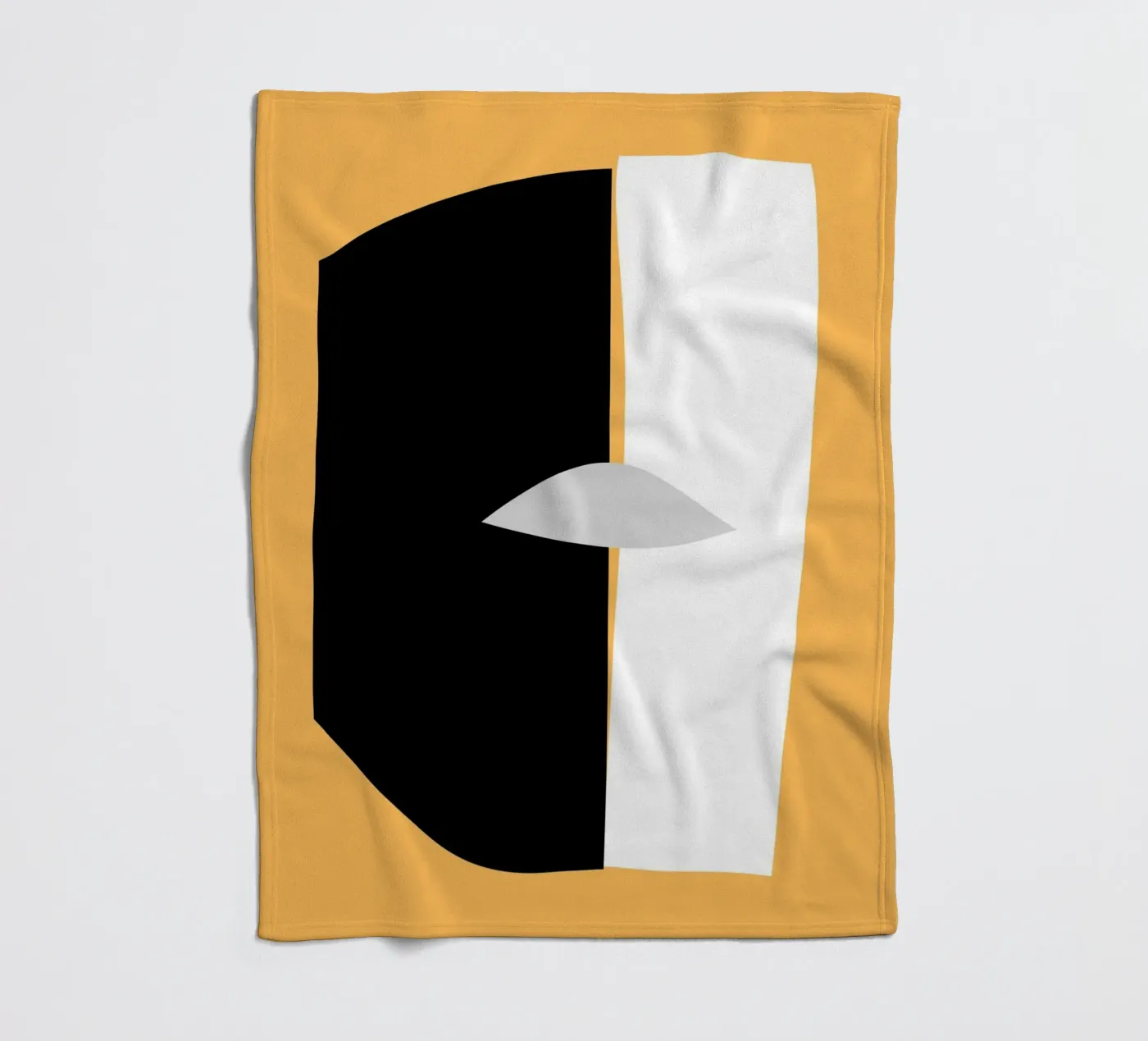 A cut fleece blanket by Little Dean